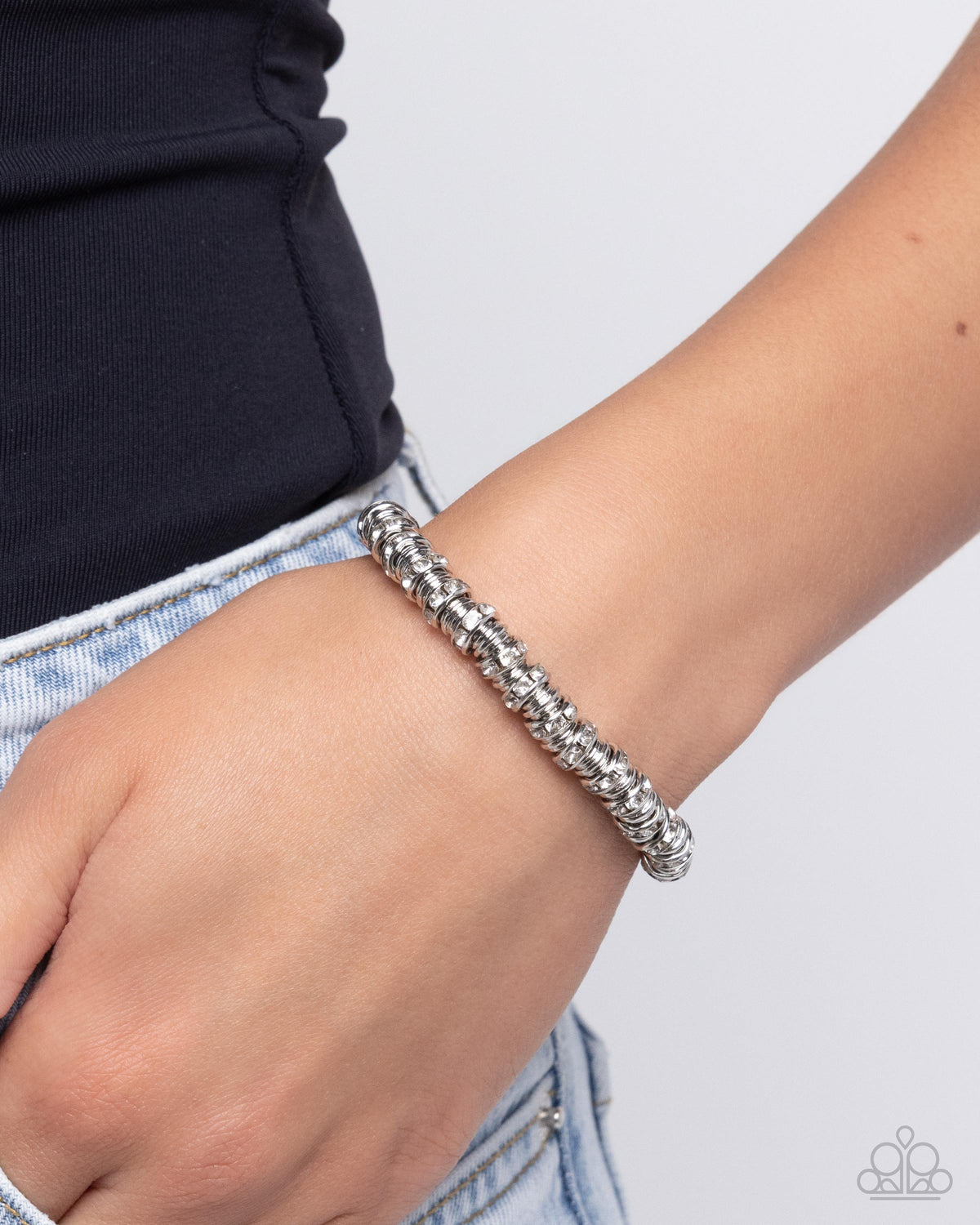 Radiant Roll Call White Rhinestone & Silver Bracelet - Paparazzi Accessories- on model - CarasShop.com - Paparazzi Jewelry by Cara Jewels