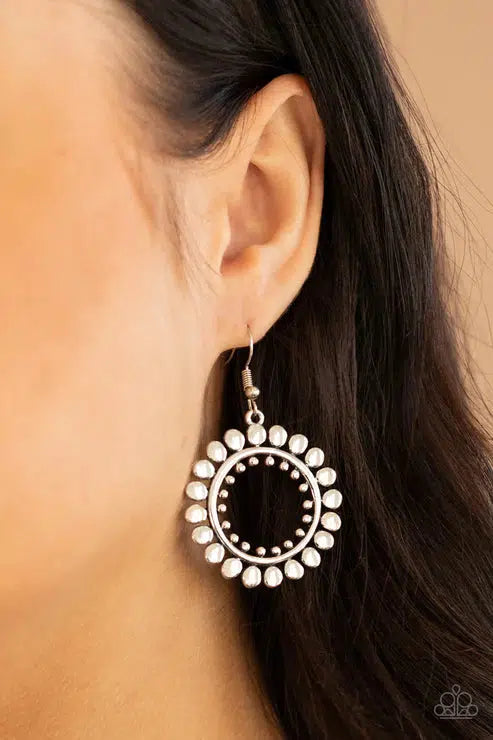 Radiating Radiance Silver Earrings - Paparazzi Accessories- on model - CarasShop.com - Paparazzi Jewelry by Cara Jewels