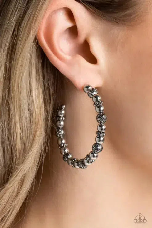 Rebuilt Ruins Silver Earrings - Paparazzi Accessories-on model - CarasShop.com - Paparazzi Jewelry by Cara Jewels