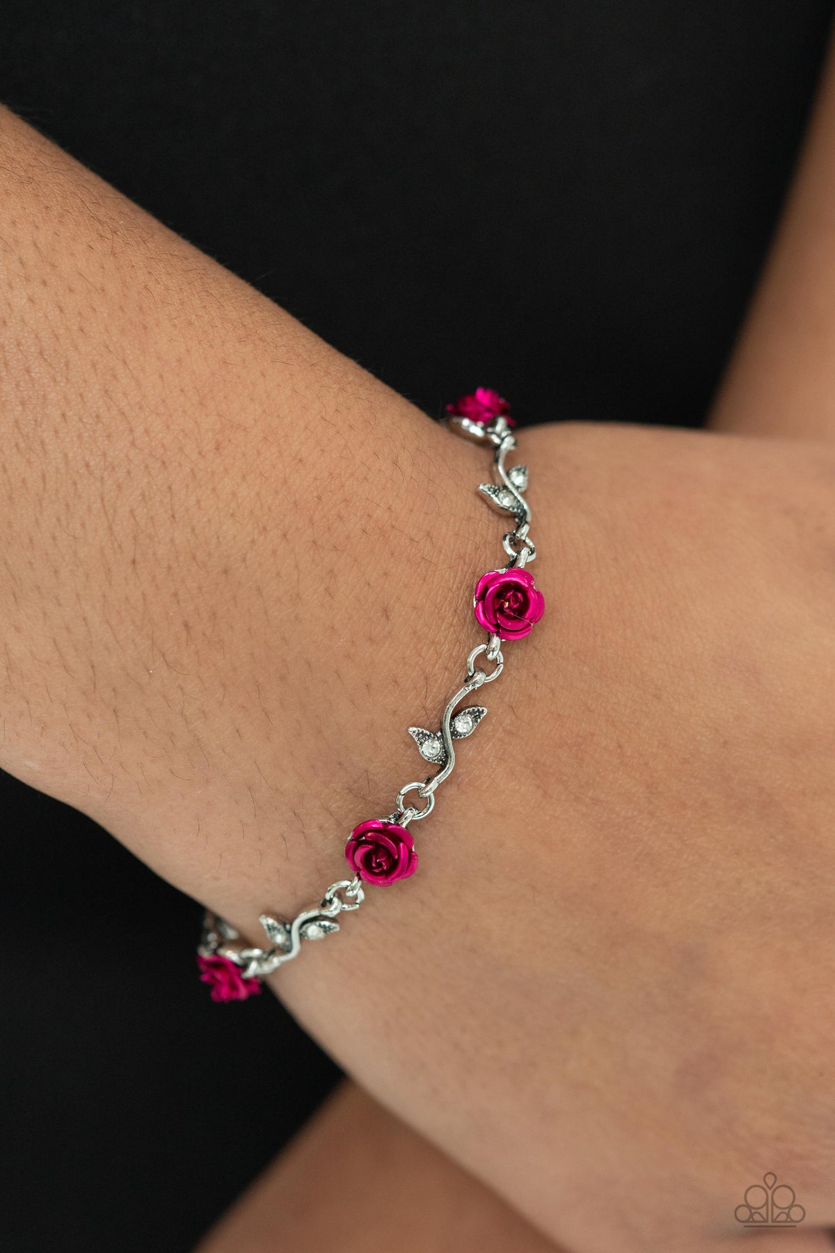 Roses Supposes Pink Floral Bracelet - Paparazzi Accessories- on model - CarasShop.com - Paparazzi Jewelry by Cara Jewels