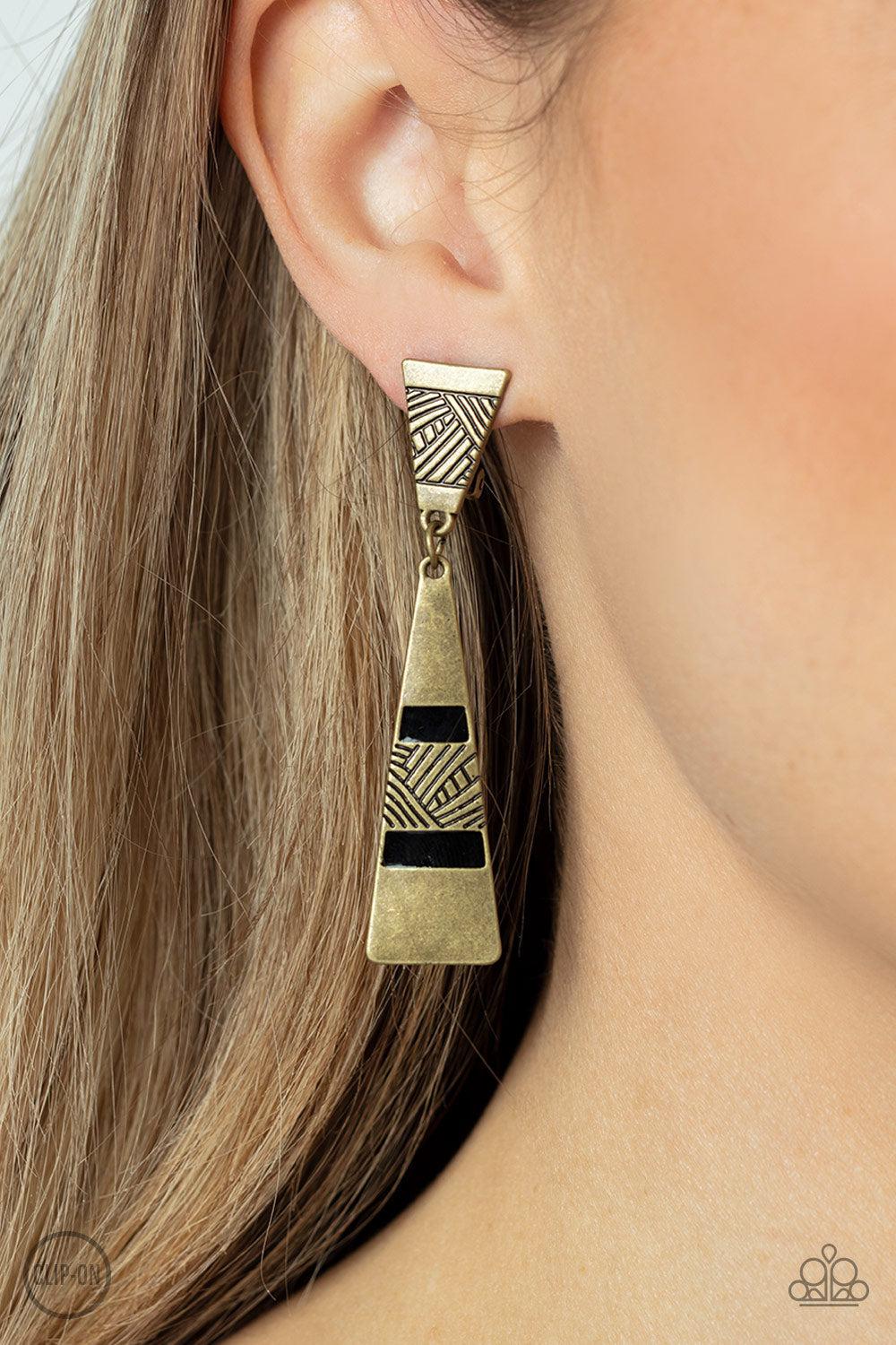 Safari Seeker Brass Clip-on Earrings - Paparazzi Accessories- on model - CarasShop.com - Paparazzi Jewelry by Cara Jewels