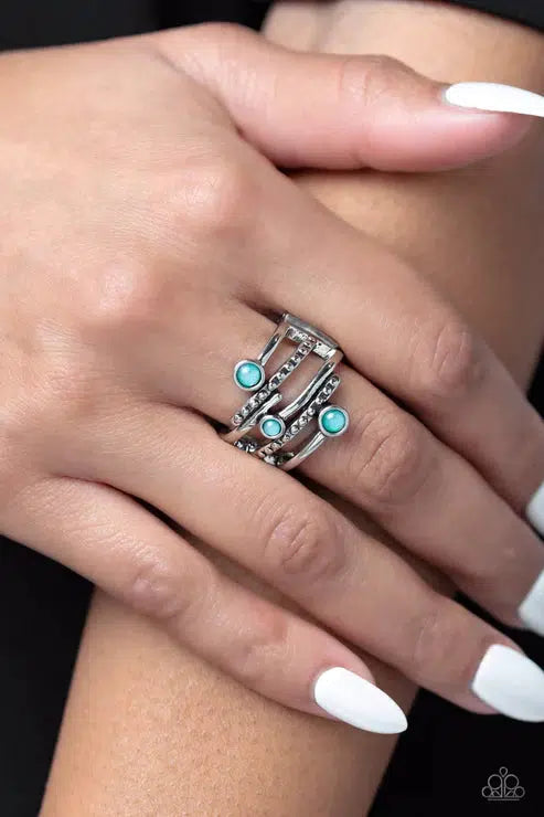 Sideline Shimmer Green Ring - Paparazzi Accessories- on model - CarasShop.com - Paparazzi Jewelry by Cara Jewels