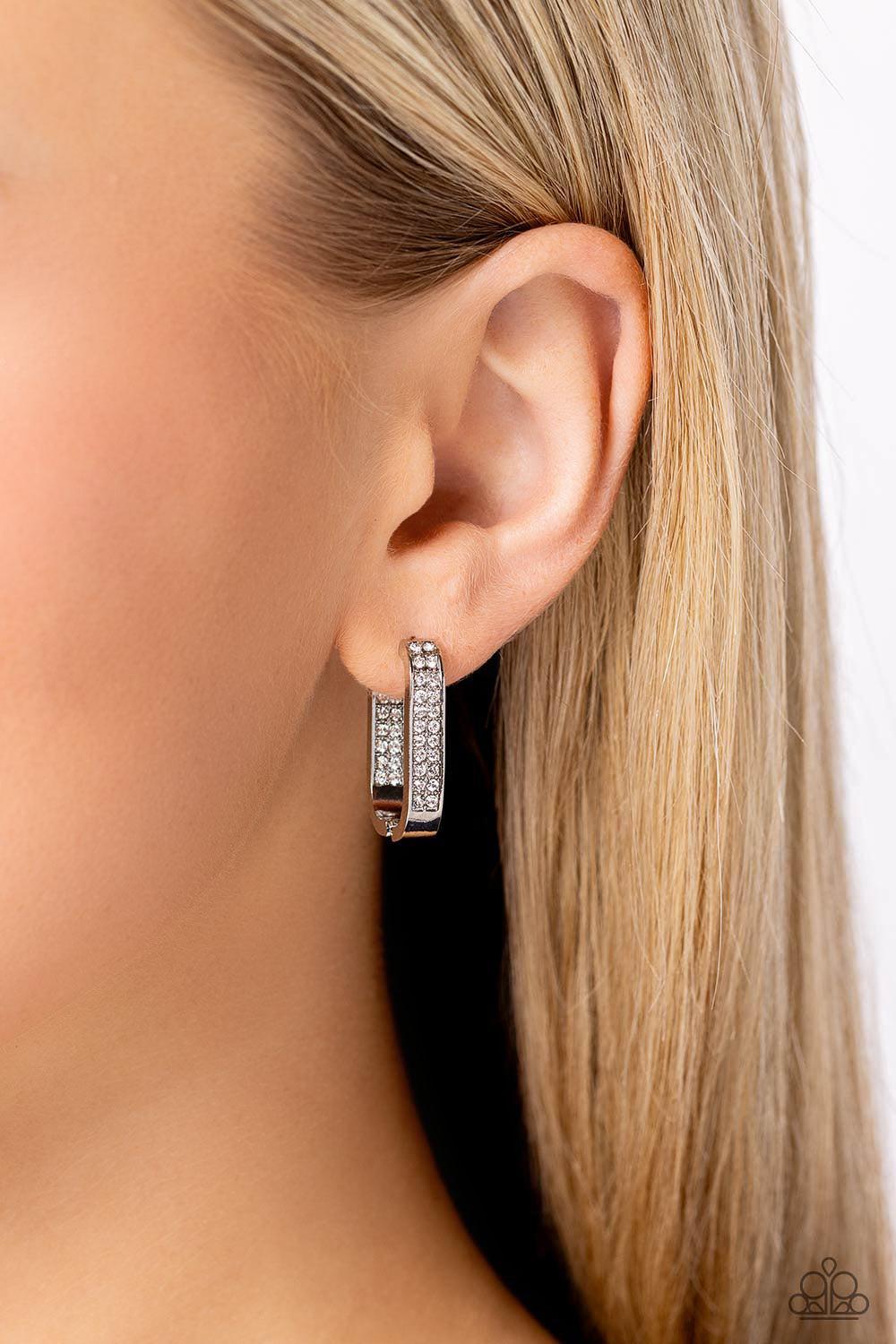 Sinuous Silhouettes White Rhinestone Hinge Hoop Earrings - Paparazzi Accessories- on model - CarasShop.com - Paparazzi Jewelry by Cara Jewels