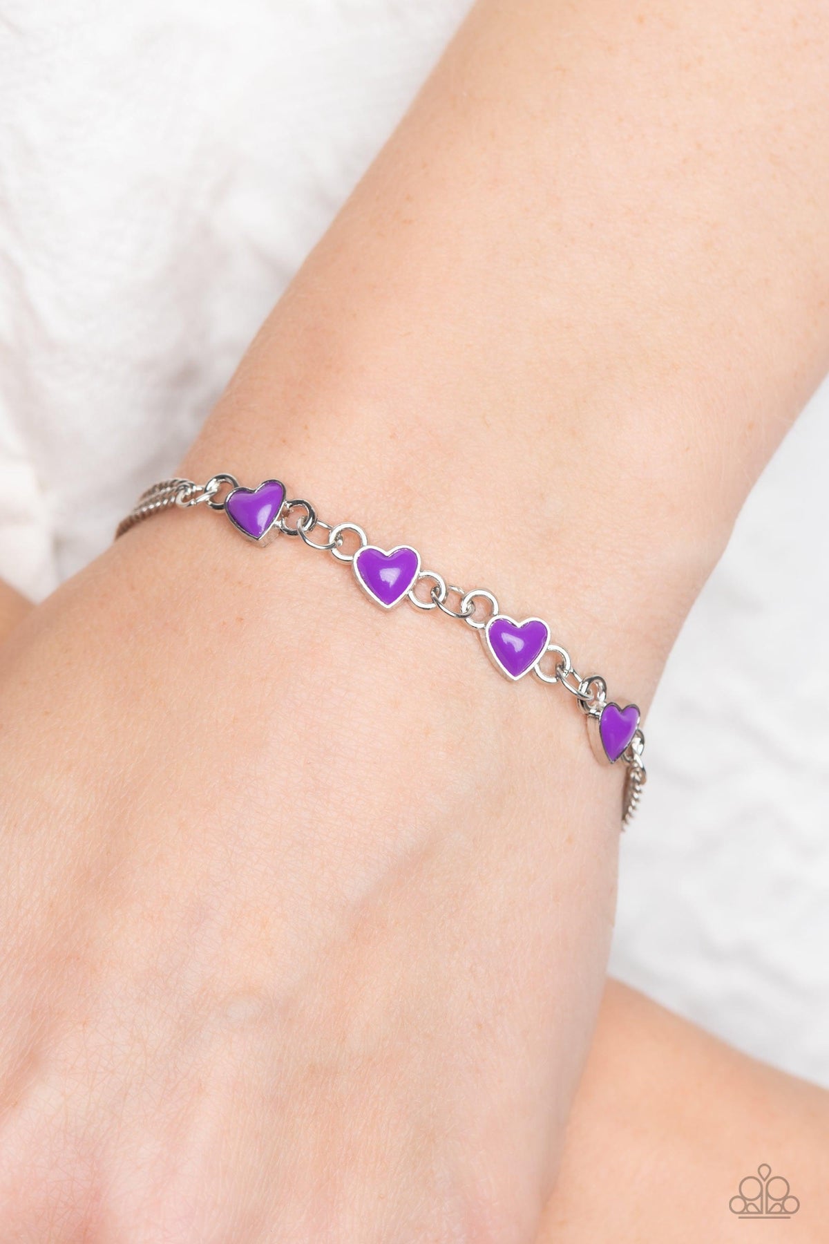 Smitten Sweethearts Purple Bracelet - Paparazzi Accessories- on model - CarasShop.com - Paparazzi Jewelry by Cara Jewels