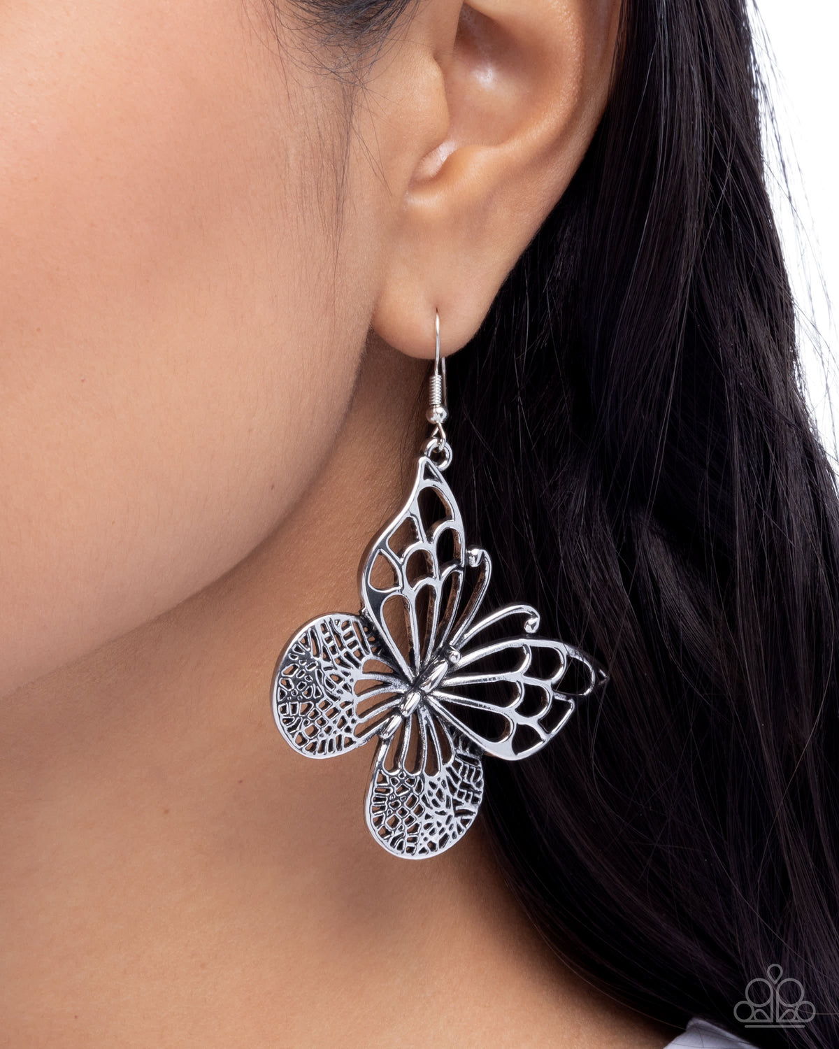 Soaring Skill Silver Butterfly Earrings - Paparazzi Accessories-on model - CarasShop.com - Paparazzi Jewelry by Cara Jewels