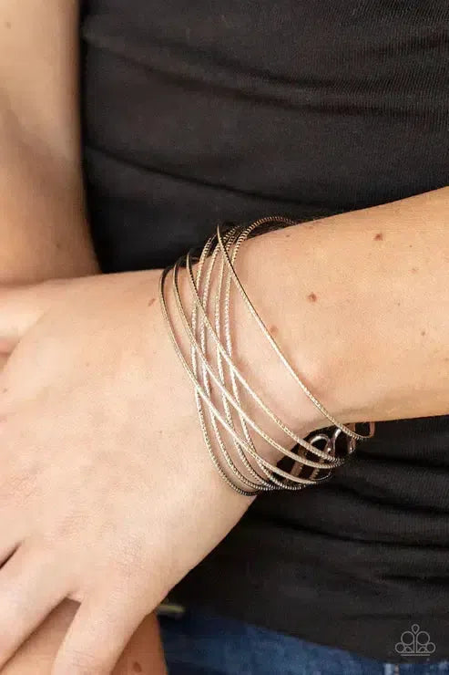 Strike Out Shimmer Silver Bracelet - Paparazzi Accessories-on model - CarasShop.com - Paparazzi Jewelry by Cara Jewels