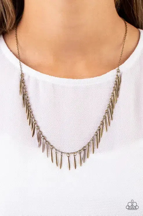 Striking Sheen Brass Necklace - Paparazzi Accessories-on model - CarasShop.com - Paparazzi Jewelry by Cara Jewels