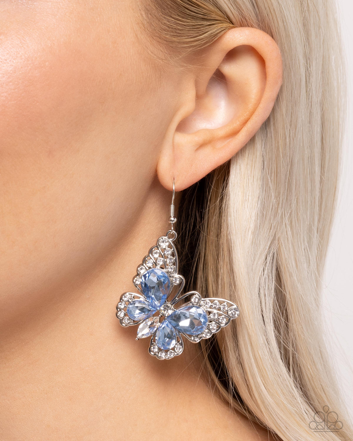 Teardrop Takeoff Blue Rhinestone Butterfly Earrings - Paparazzi Accessories- on model - CarasShop.com - Paparazzi Jewelry by Cara Jewels