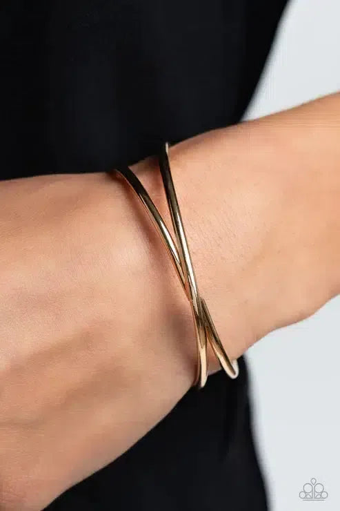 Teasing Twist Gold Bracelet - Paparazzi Accessories-on model - CarasShop.com - Paparazzi Jewelry by Cara Jewels