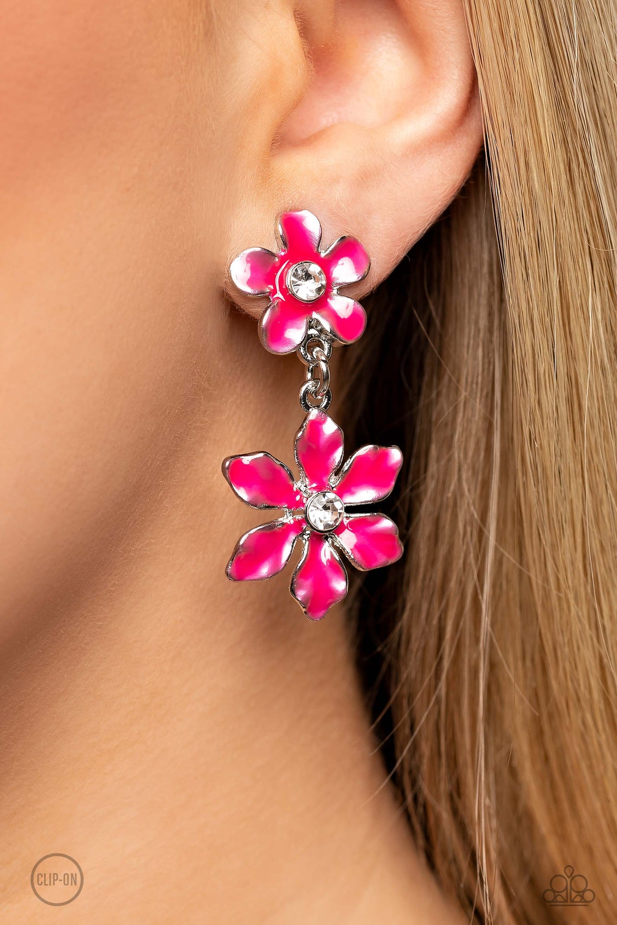 Transparent Talent Pink Flower Clip On Earrings - Paparazzi Accessories- on model - CarasShop.com - Paparazzi Jewelry by Cara Jewels