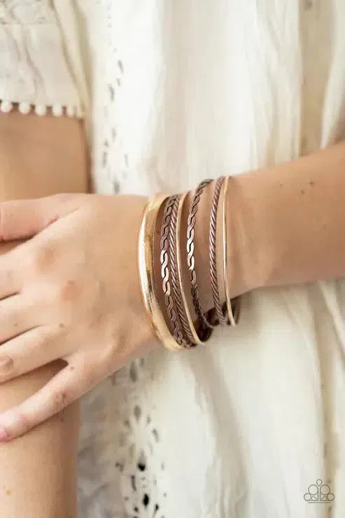 Trophy Texture Multi Bracelet - Paparazzi Accessories-on model - CarasShop.com - Paparazzi Jewelry by Cara Jewels