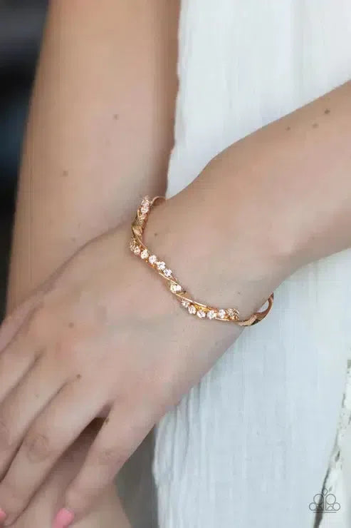 Twisted Twinkle Gold Bracelet - Paparazzi Accessories-on model - CarasShop.com - Paparazzi Jewelry by Cara Jewels