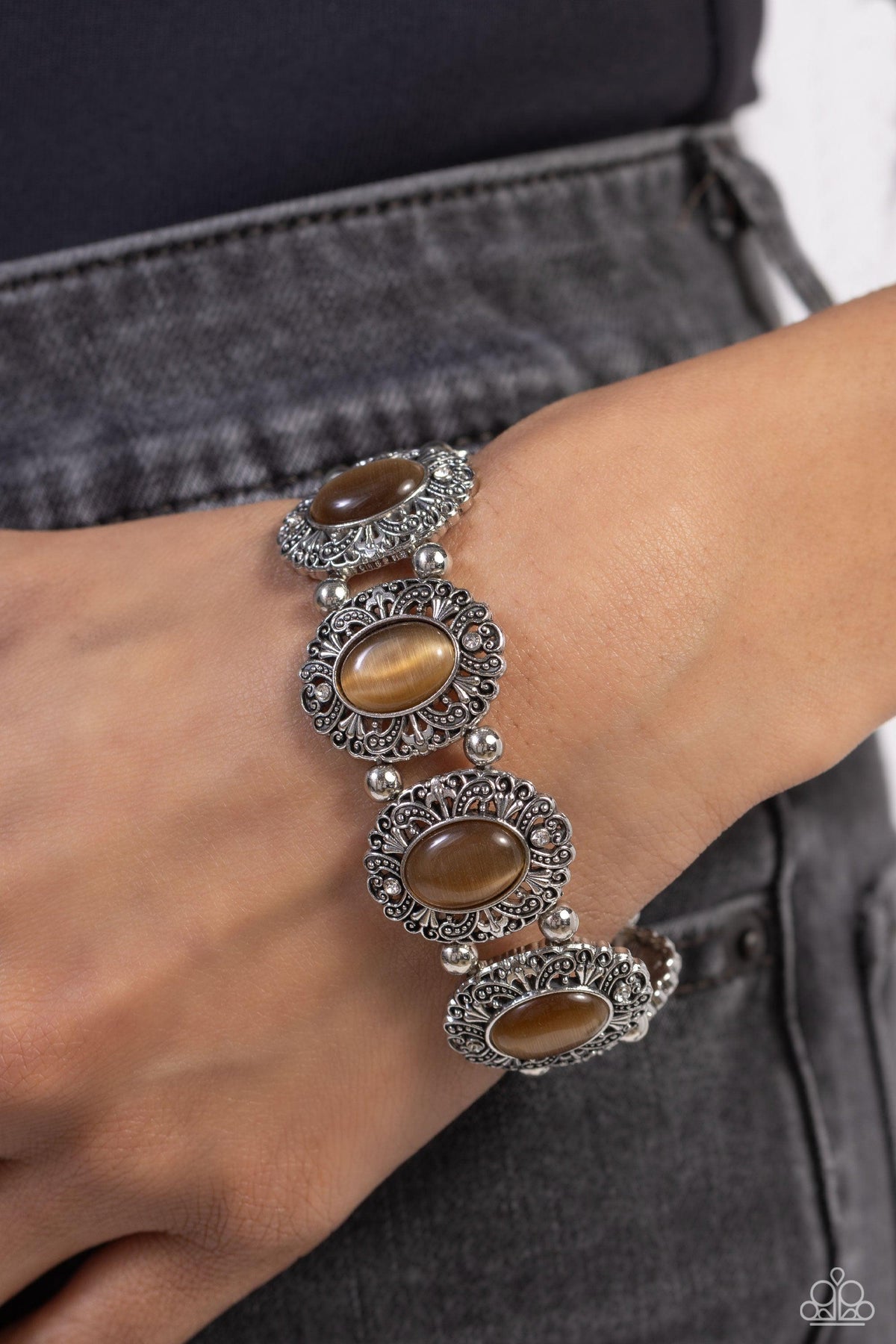 Vintage Vault Brown Cat's Eye Stone Bracelet - Paparazzi Accessories- on model - CarasShop.com - Paparazzi Jewelry by Cara Jewels