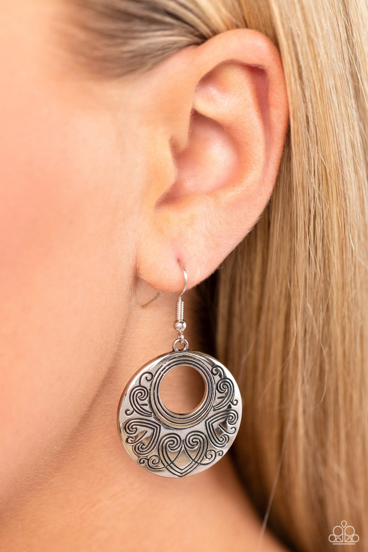 Western Beau Silver Heart Earrings - Paparazzi Accessories- on model - CarasShop.com - Paparazzi Jewelry by Cara Jewels