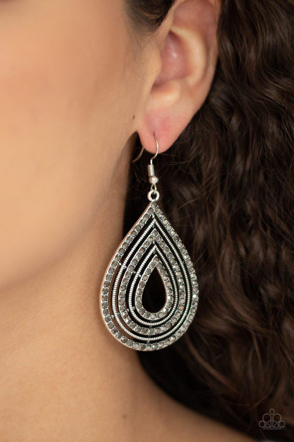 5th Avenue Attraction Silver Rhinestone Teardrop Earrings - Paparazzi Accessories- on model - CarasShop.com - Paparazzi Jewelry by Cara Jewels
