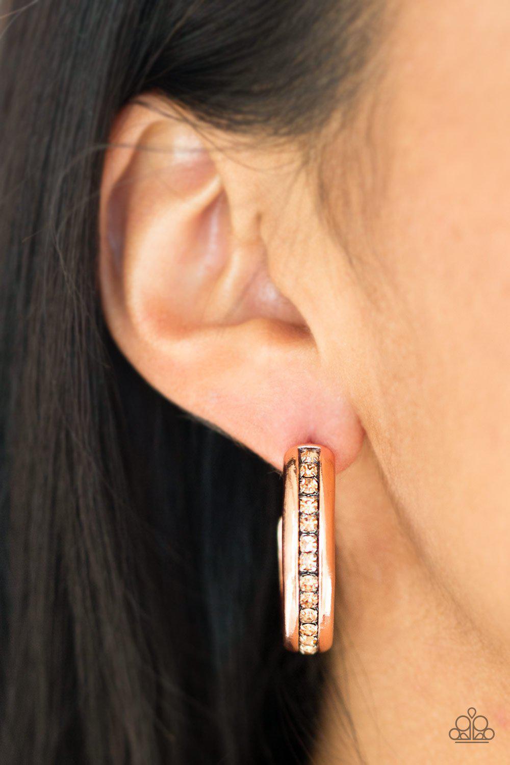 5th Avenue Fashionista Copper Rhinestone Hoop Earrings - Paparazzi Accessories- on model - CarasShop.com - Paparazzi Jewelry by Cara Jewels