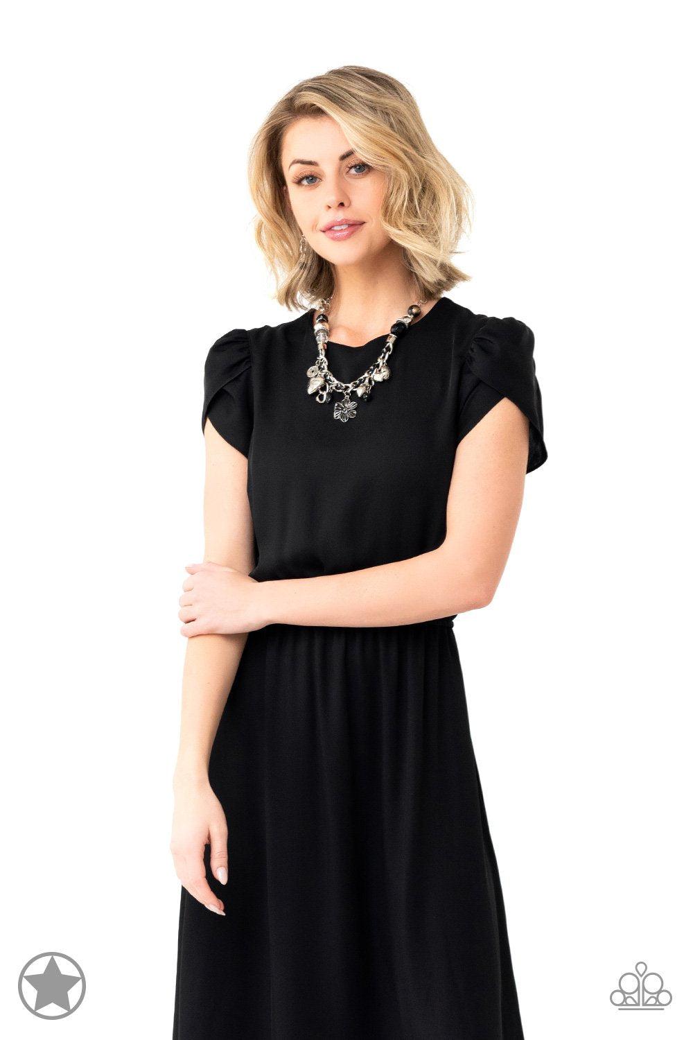 Charmed, I Am Sure Black Charm Necklace - Paparazzi Accessories- stylized on model - CarasShop.com - Paparazzi Jewelry by Cara Jewels