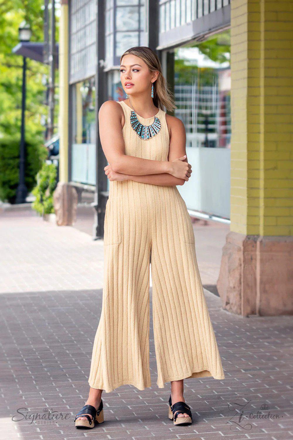 The Ebony 2022 Zi Signature Collection Necklace - Paparazzi Accessories stylized on model in casual dress - CarasShop.com - Paparazzi Jewelry by Cara Jewels