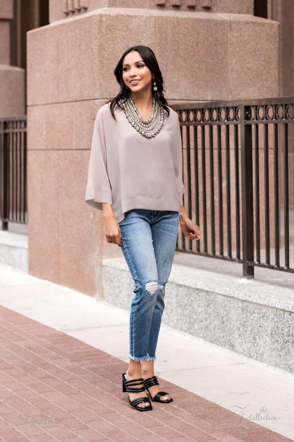 The Liberty 2021 Zi Signature Collection Necklace - Paparazzi Accessories stylized on model in casual dress - CarasShop.com - Paparazzi Jewelry by Cara Jewels