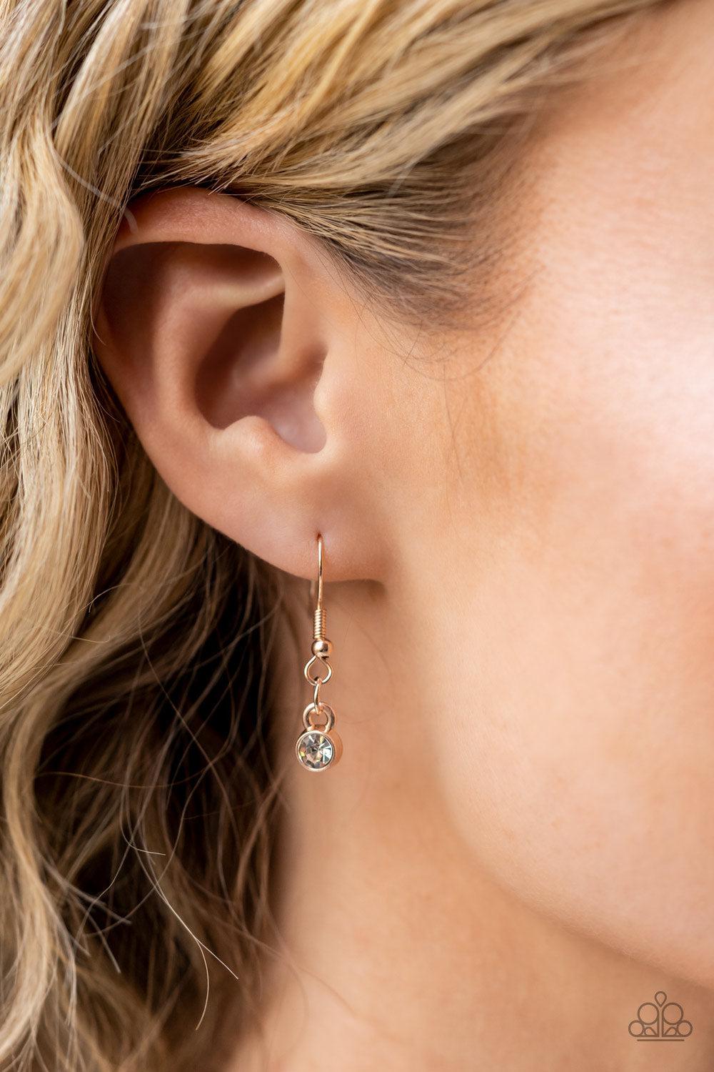 Warp Speed Rose Gold and Iridescent Rhinestone Necklace - Paparazzi Accessories - free matching earrings -CarasShop.com - Paparazzi Jewelry by Cara Jewels