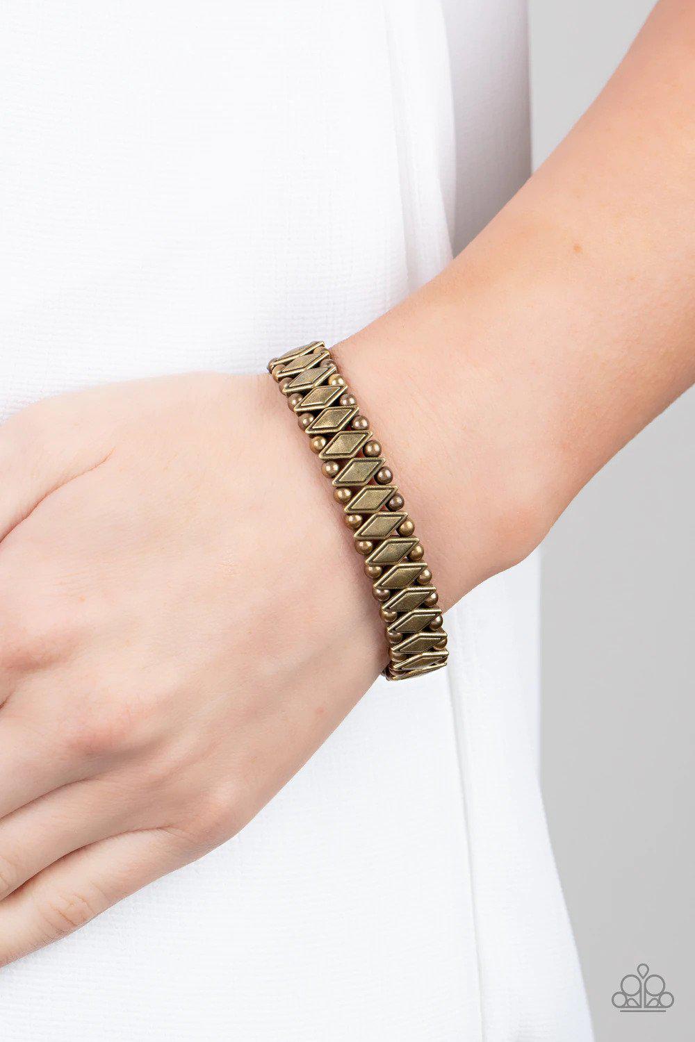 Abstract Advisory Brass Bracelet - Paparazzi Accessories- on model - CarasShop.com - Paparazzi Jewelry by Cara Jewels