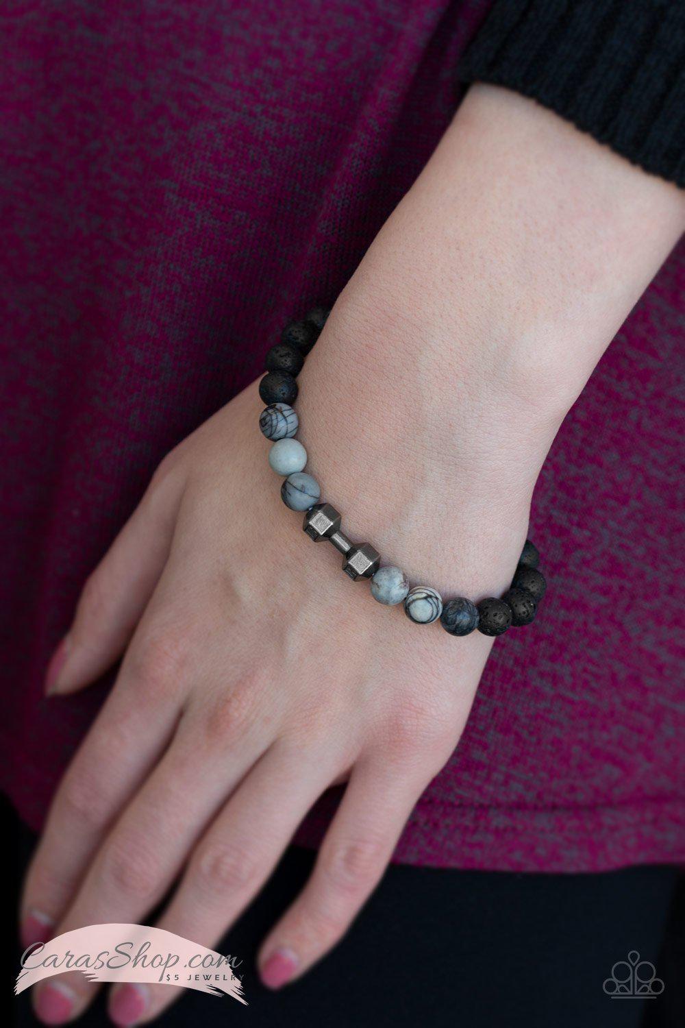 All About The Present Black Lava Rock Bracelet - Paparazzi Accessories- on model - CarasShop.com - Paparazzi Jewelry by Cara Jewels