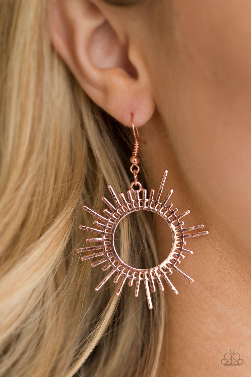 All Sizzle Shiny Copper Sunburst Earrings - Paparazzi Accessories- on model - CarasShop.com - Paparazzi Jewelry by Cara Jewels