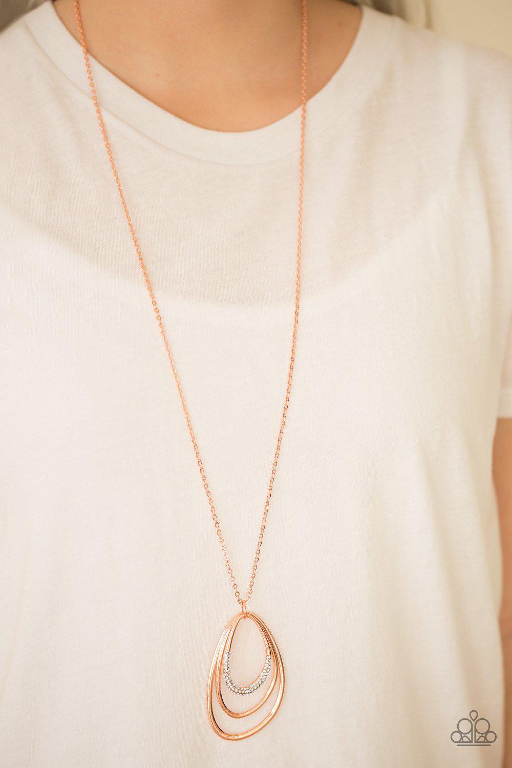Already Aglow Shiny Copper and White Rhinestone Teardrop Necklace - Paparazzi Accessories- on model - CarasShop.com - Paparazzi Jewelry by Cara Jewels