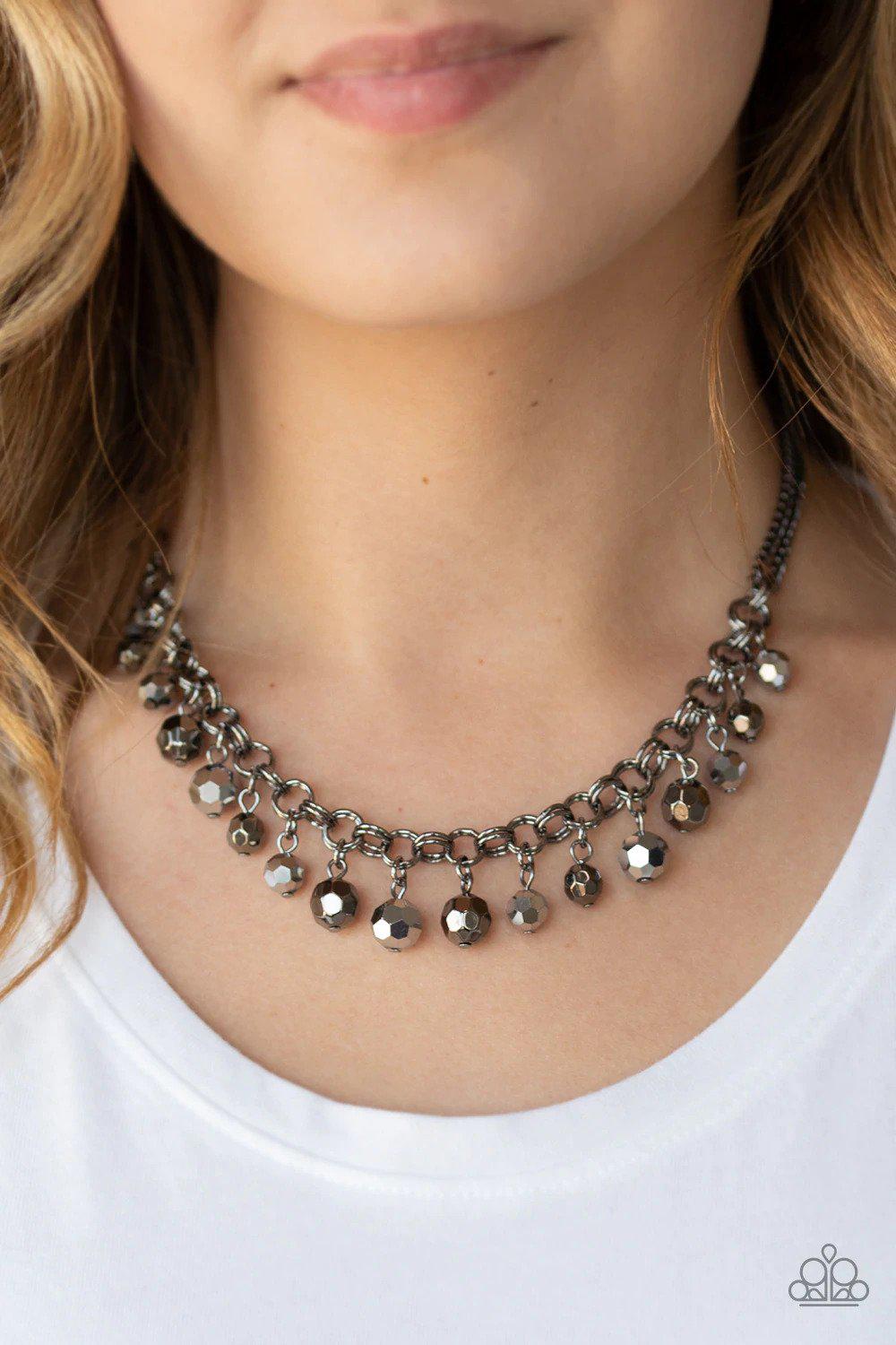And The Crowd Cheers Gunmetal Black Necklace - Paparazzi Accessories- on model - CarasShop.com - Paparazzi Jewelry by Cara Jewels