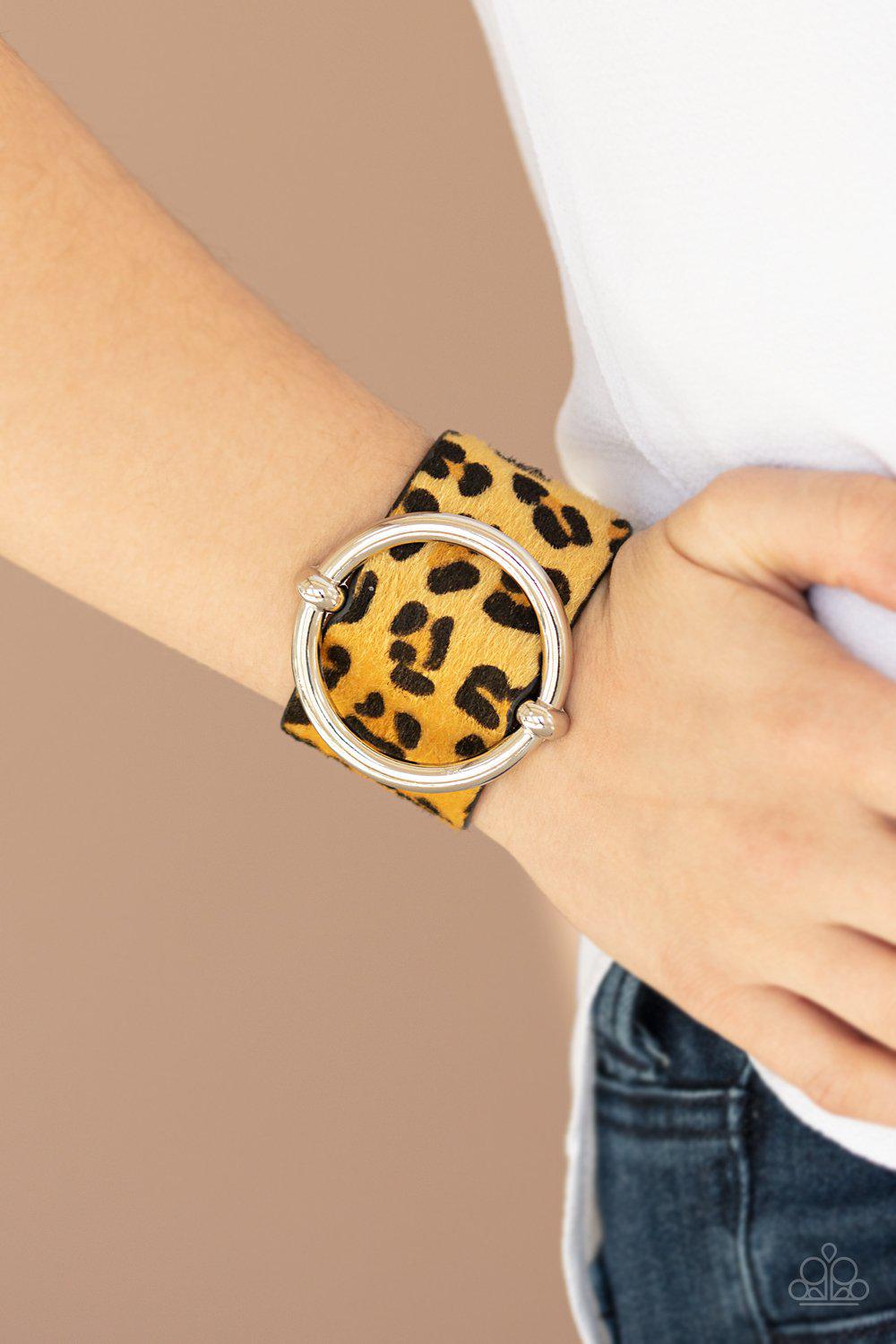 Asking FUR Trouble Yellow Cheetah Print Urban Wrap Snap Bracelet - Paparazzi Accessories- on model - CarasShop.com - Paparazzi Jewelry by Cara Jewels