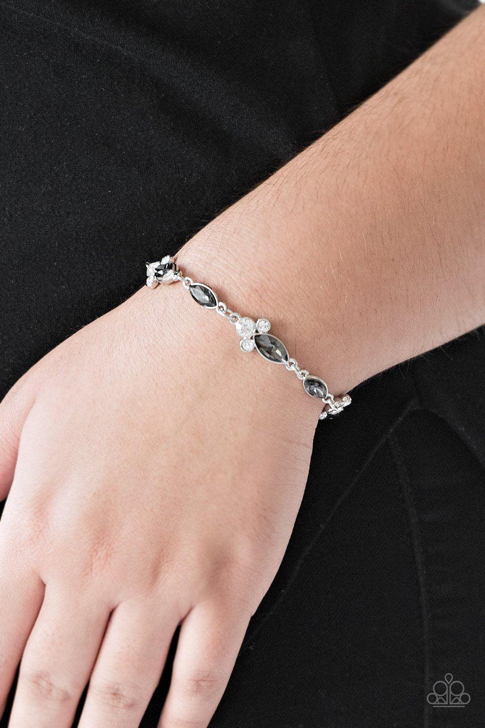 At Any Cost Silver and White Gem Bracelet - Paparazzi Accessories- on model - CarasShop.com - Paparazzi Jewelry by Cara Jewels