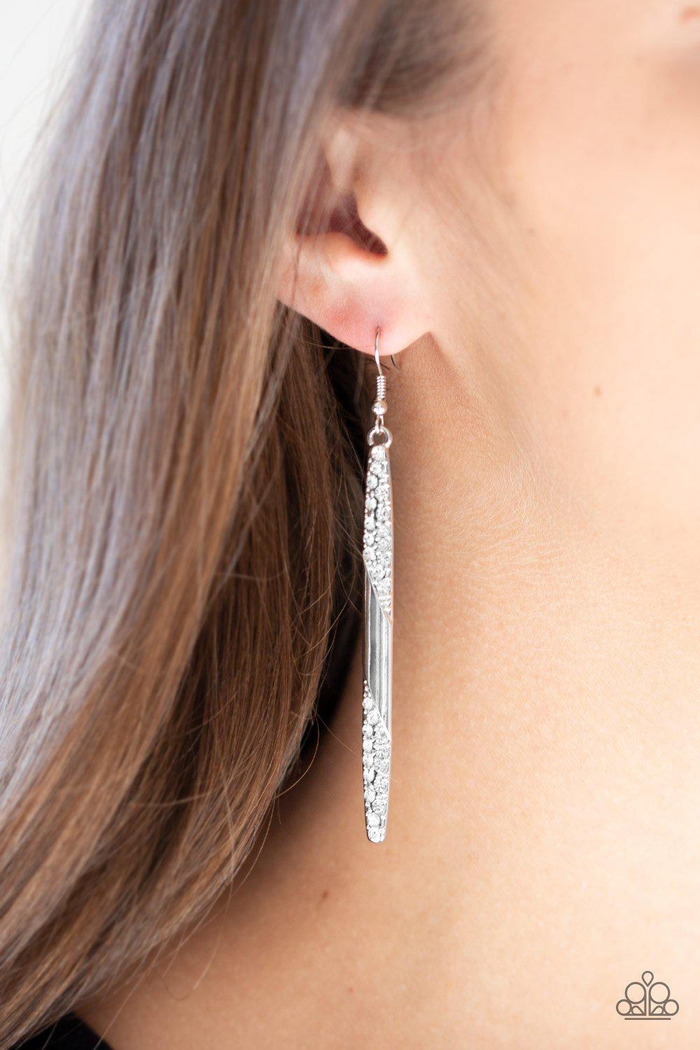 Award Show Attitude Silver and White Earrings - Paparazzi Accessories- on model - CarasShop.com - Paparazzi Jewelry by Cara Jewels