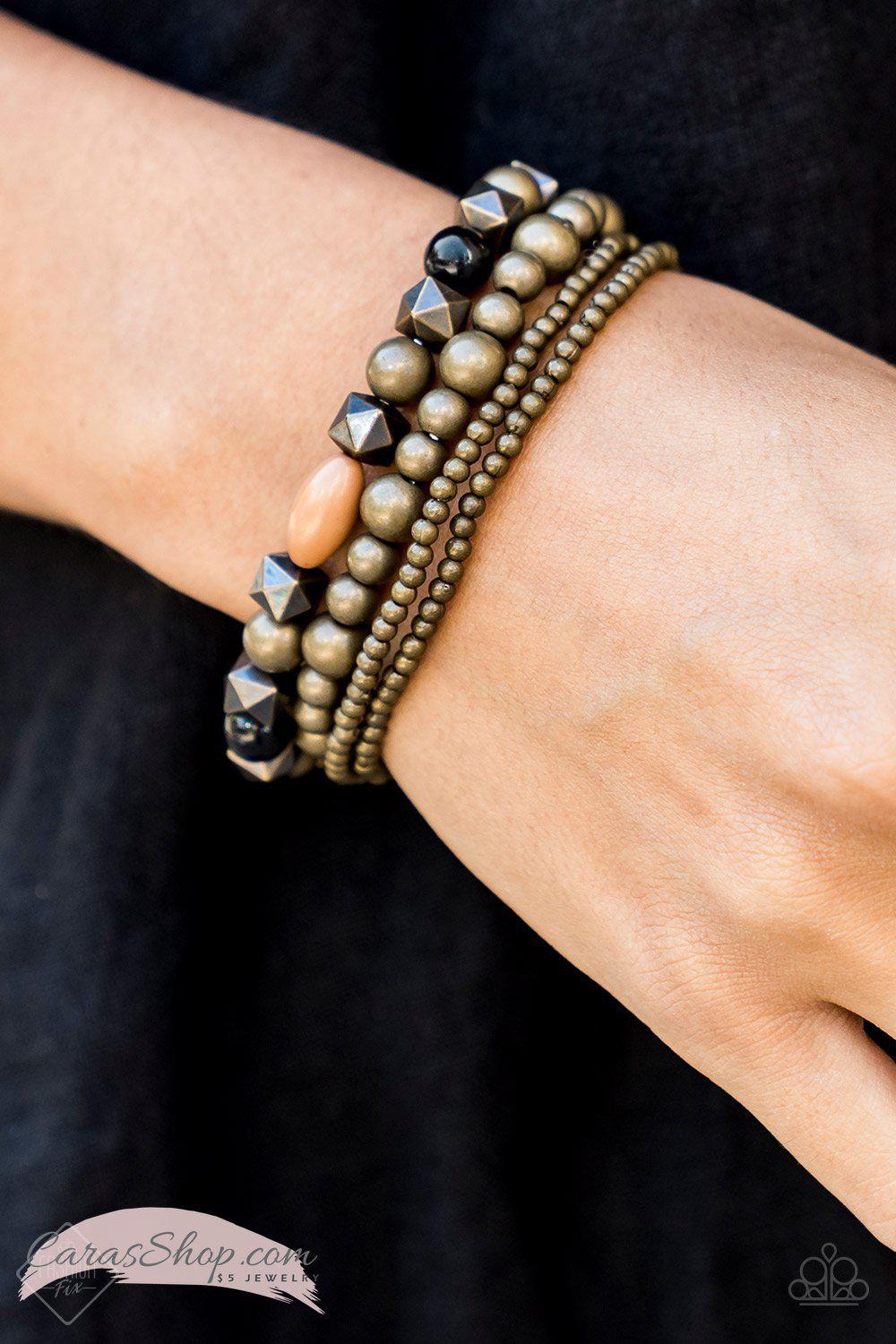 Babe-alicious Brass Stretch Bracelet Set - Paparazzi Accessories- on model - CarasShop.com - Paparazzi Jewelry by Cara Jewels