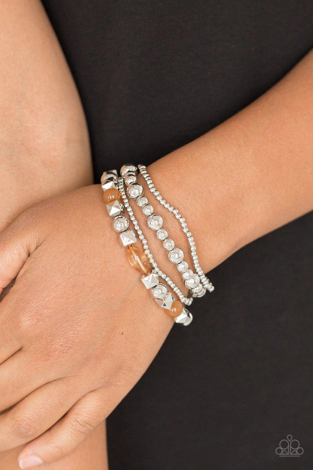 Babe-alicious Brown Bracelet - Paparazzi Accessories- on model - CarasShop.com - Paparazzi Jewelry by Cara Jewels