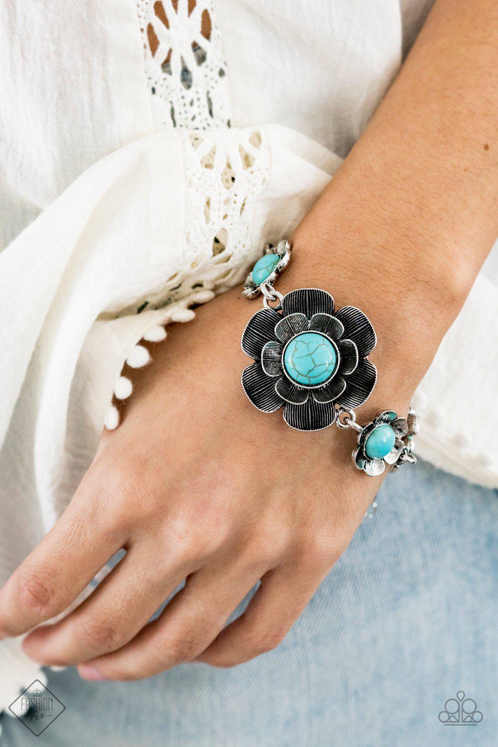 Badlands Blossom Turquoise Blue Stone and Silver Flower Bracelet - Paparazzi Accessories- on model - CarasShop.com - Paparazzi Jewelry by Cara Jewels