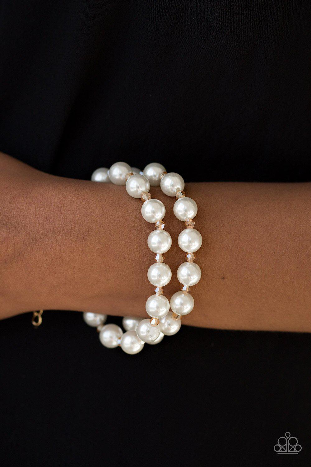 Ballroom and Board Gold and White Pearl Bracelet - Paparazzi Accessories- on model - CarasShop.com - Paparazzi Jewelry by Cara Jewels