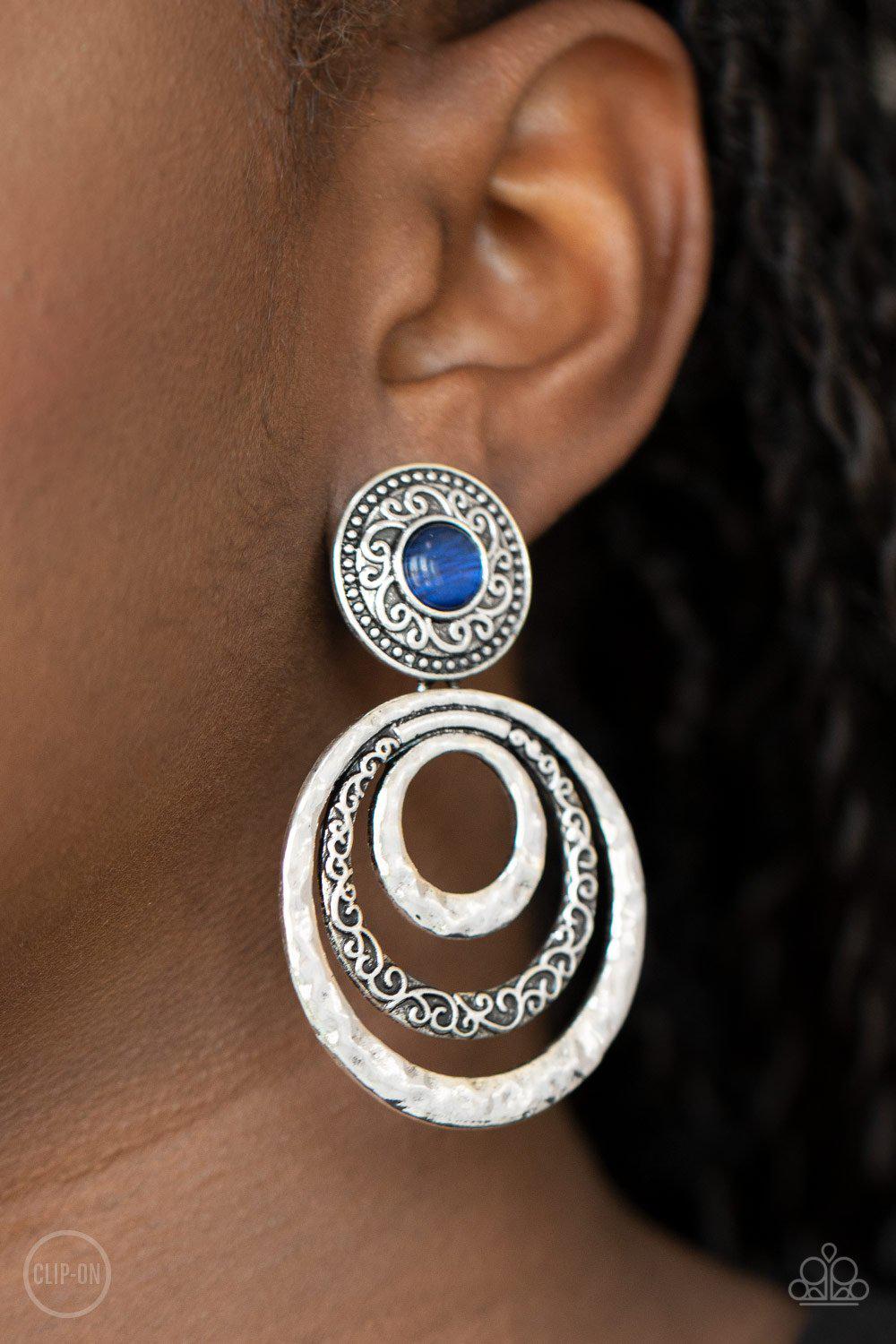 Bare Your Soul Blue Cat's Eye Stone Clip-On Earrings - Paparazzi Accessories- on model - CarasShop.com - Paparazzi Jewelry by Cara Jewels