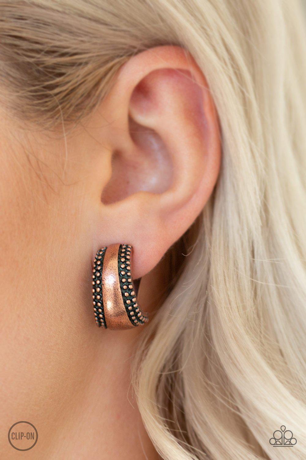 Bells Ringing Copper Clip-On Earrings - Paparazzi Accessories- on model - CarasShop.com - Paparazzi Jewelry by Cara Jewels