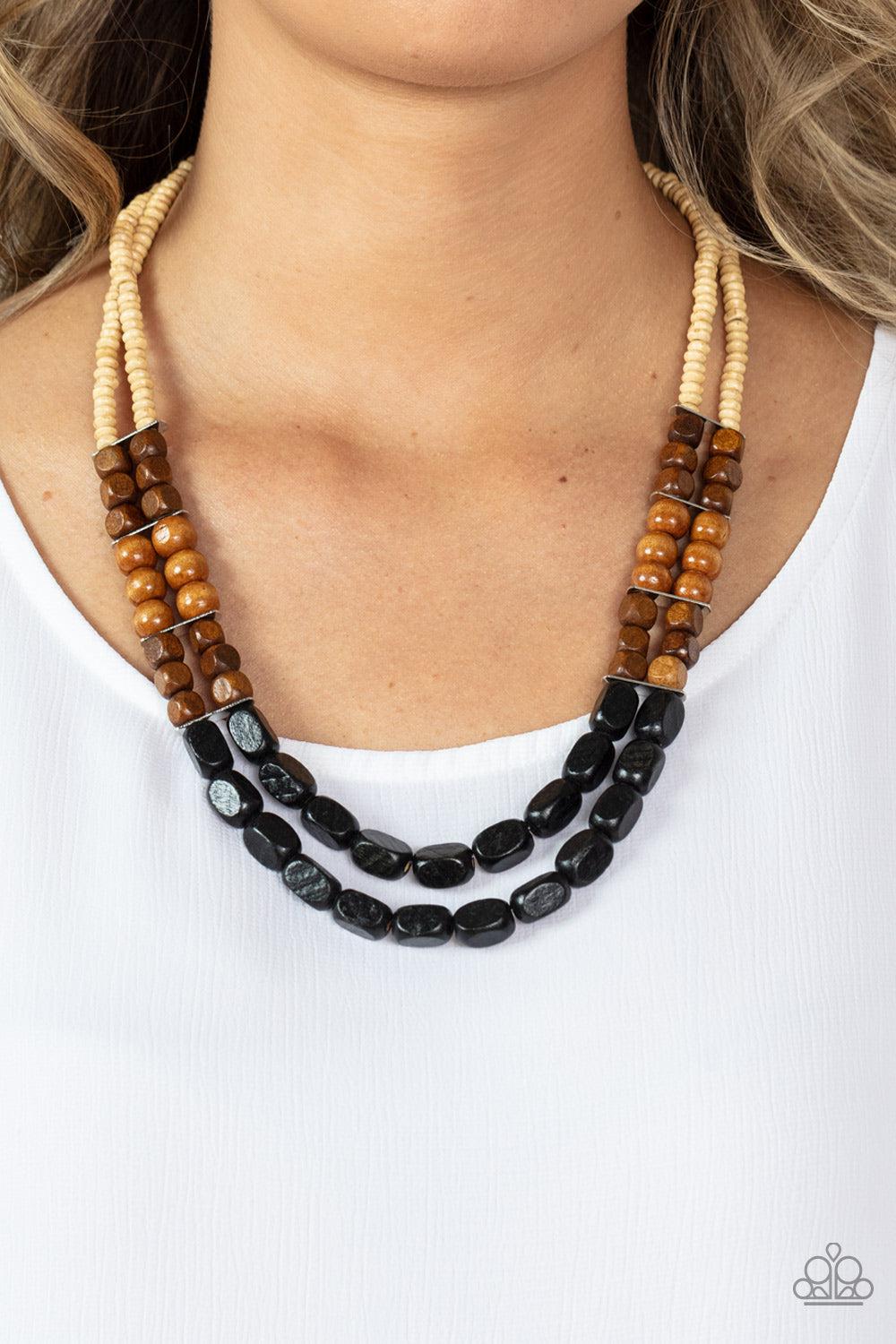 Bermuda Bellhop Black, White & Brown Wood Necklace - Paparazzi Accessories- on model - CarasShop.com - Paparazzi Jewelry by Cara Jewels