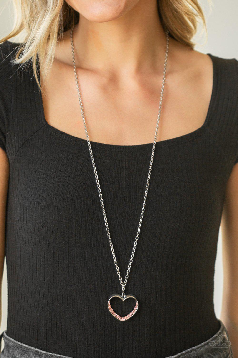 Bighearted Silver and Pink Heart Necklace - Paparazzi Accessories- on model - CarasShop.com - Paparazzi Jewelry by Cara Jewels