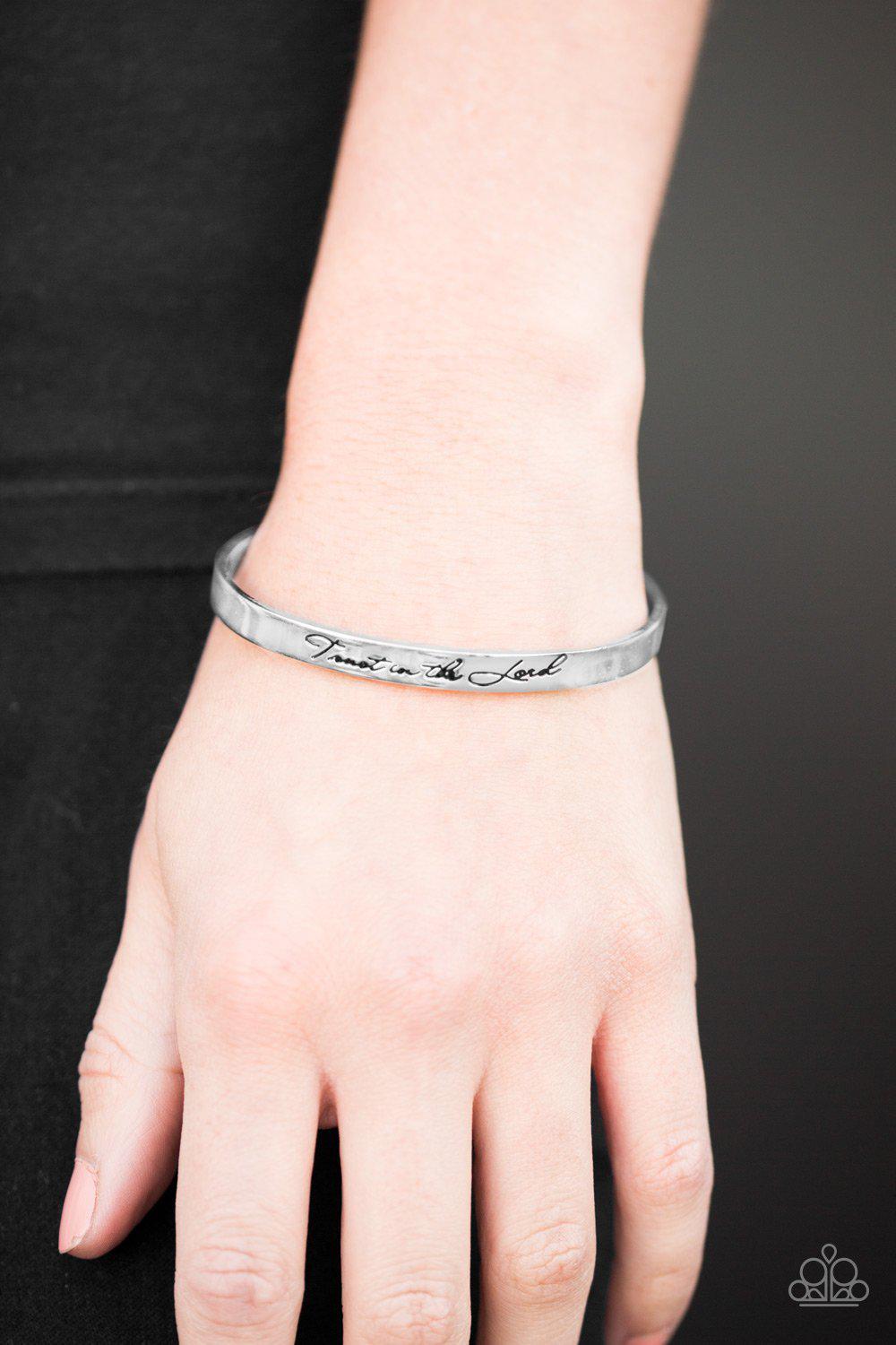 Blessed Is The One Who Trusts Silver Cuff Bracelet - Paparazzi Accessories- on model - CarasShop.com - Paparazzi Jewelry by Cara Jewels