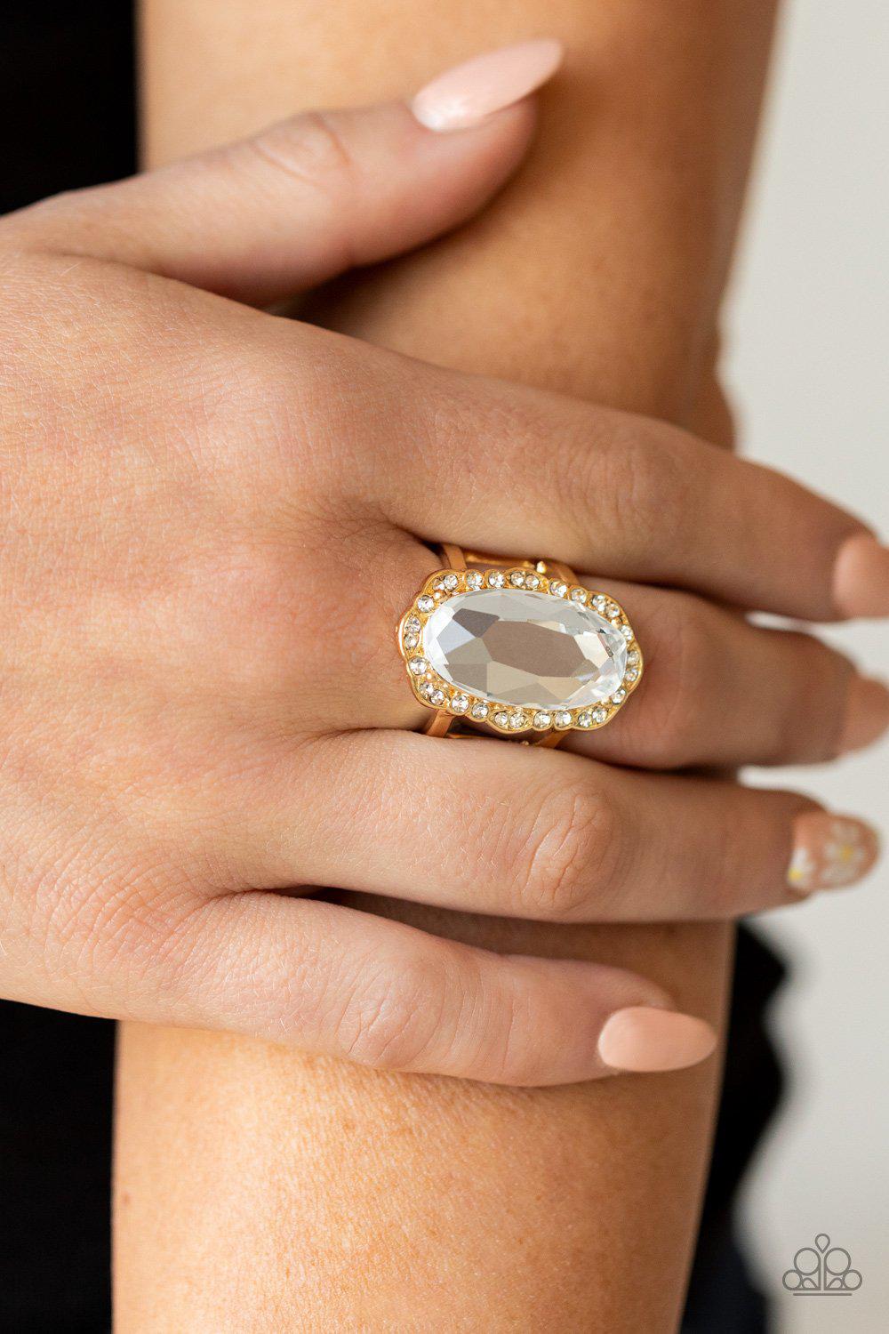 BLING to Heel Gold and White Rhinestone Ring - Paparazzi Accessories- on model - CarasShop.com - Paparazzi Jewelry by Cara Jewels