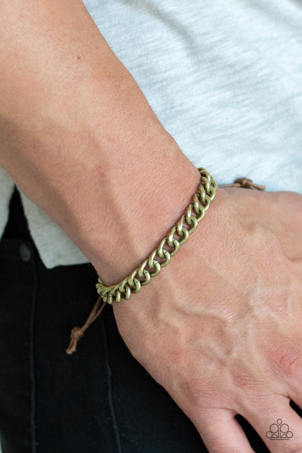Blitz Men's Brass Urban Bracelet - Paparazzi Accessories- on model - CarasShop.com - Paparazzi Jewelry by Cara Jewels