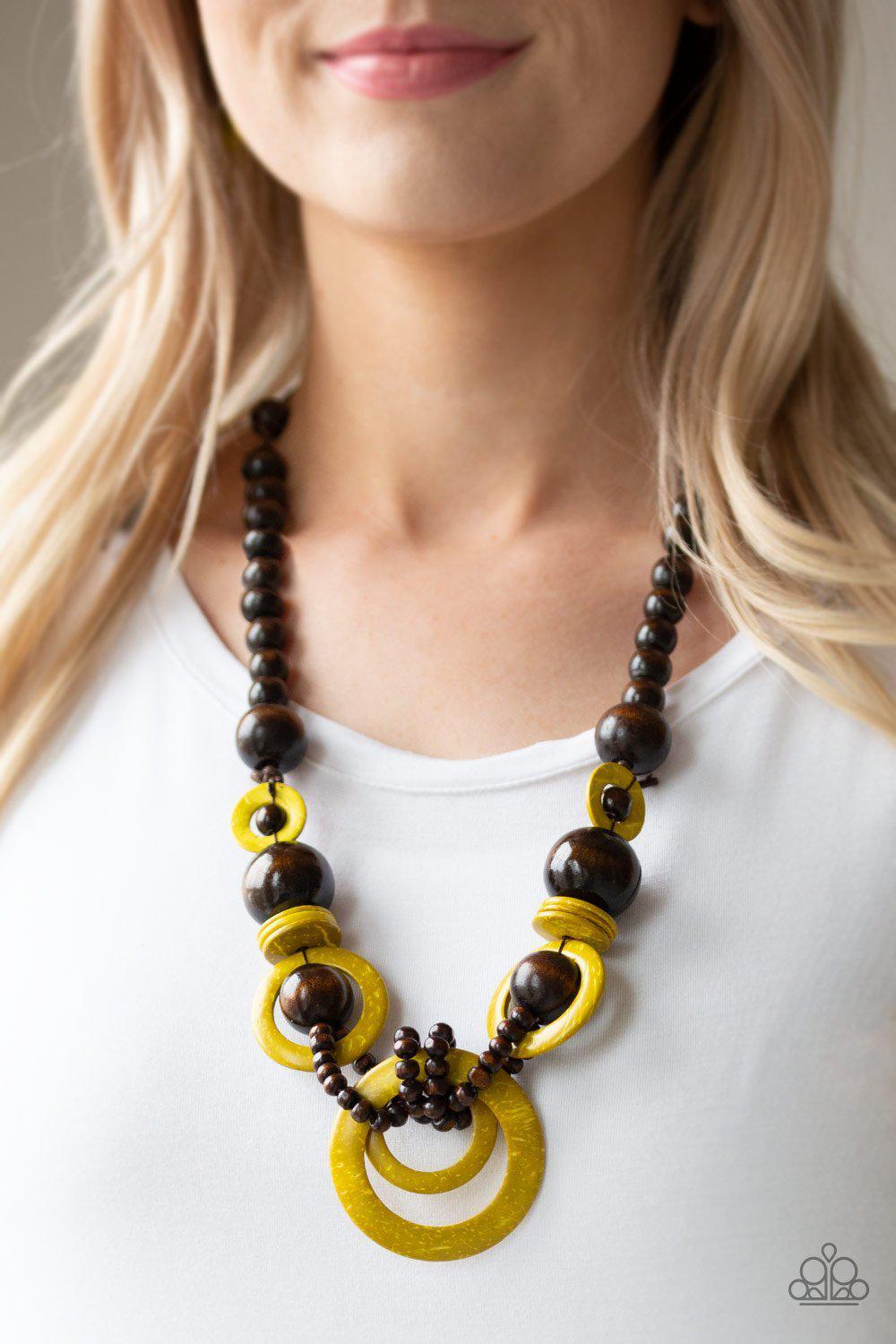 Boardwalk Party Yellow and Brown Wood Necklace - Paparazzi Accessories- on model - CarasShop.com - Paparazzi Jewelry by Cara Jewels