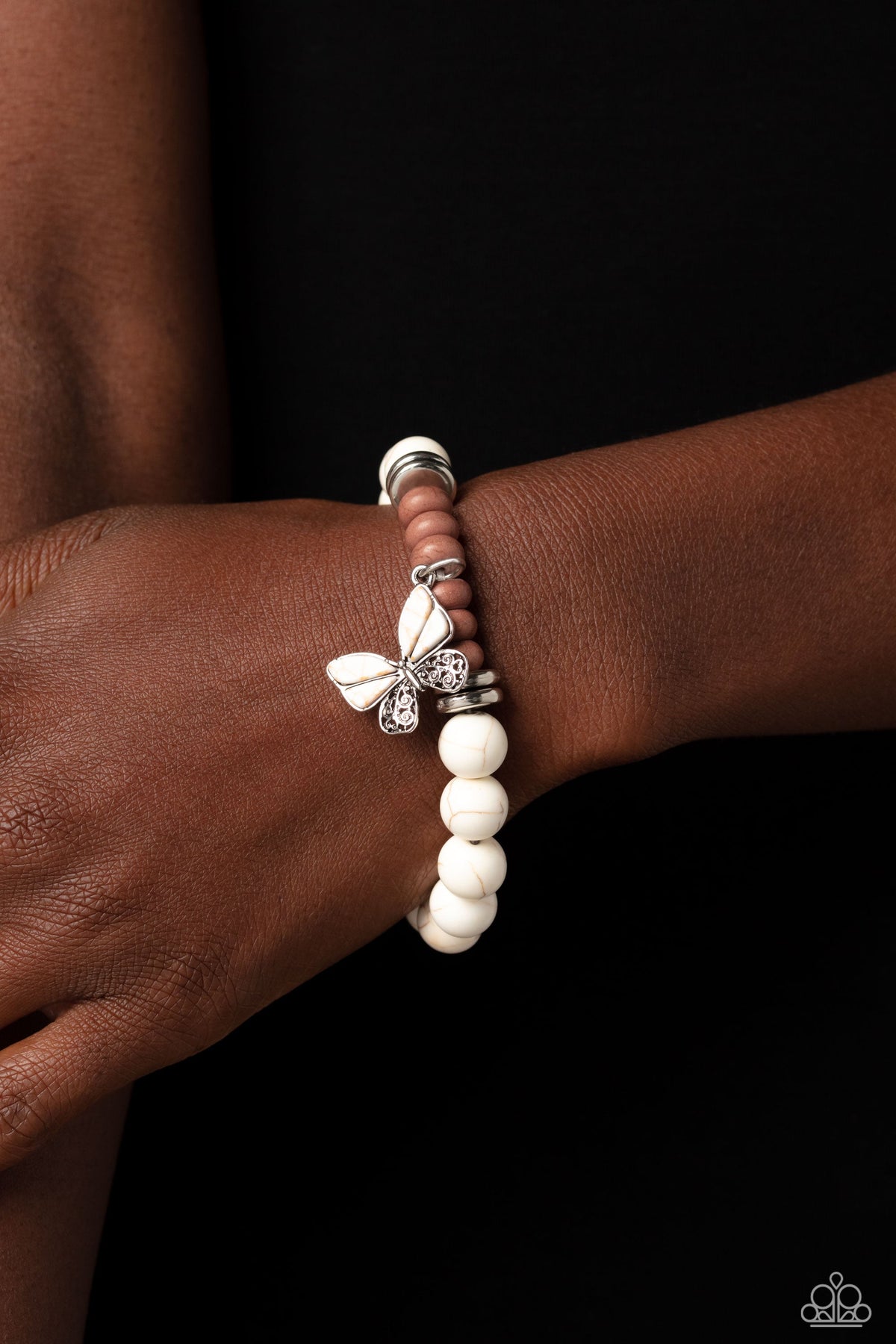 Bold Butterfly White Stone Bracelet - Paparazzi Accessories- on model - CarasShop.com - Paparazzi Jewelry by Cara Jewels