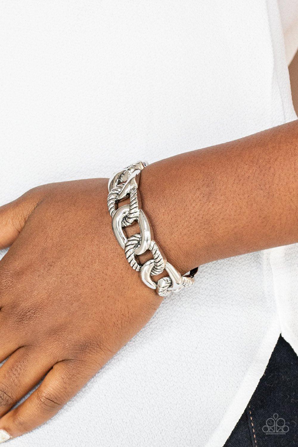 Bold Move Silver Chain Link Hinged Bracelet - Paparazzi Accessories- on model - CarasShop.com - Paparazzi Jewelry by Cara Jewels