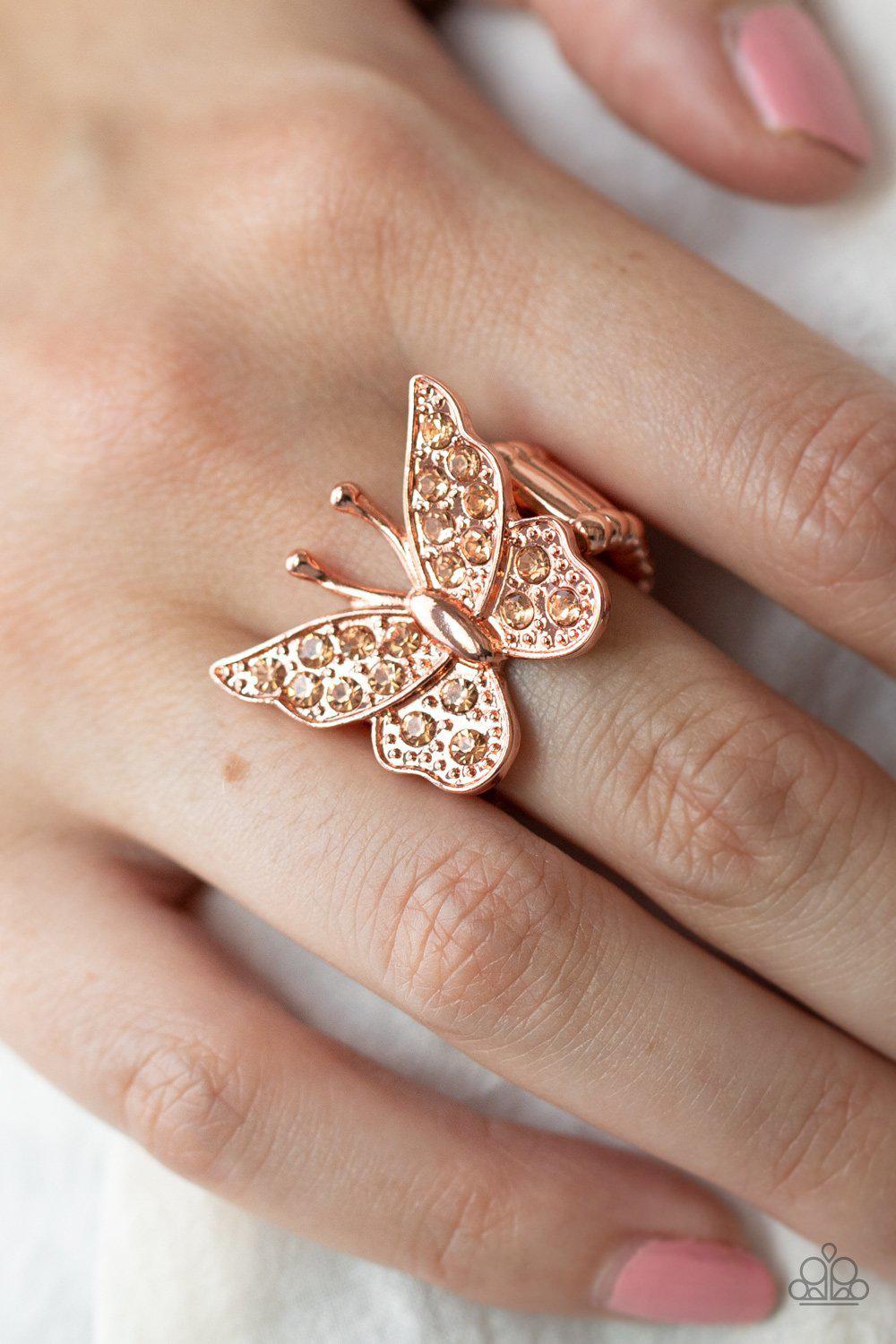 Bona Fide Butterfly Copper Rhinestone Ring - Paparazzi Accessories- on model - CarasShop.com - Paparazzi Jewelry by Cara Jewels