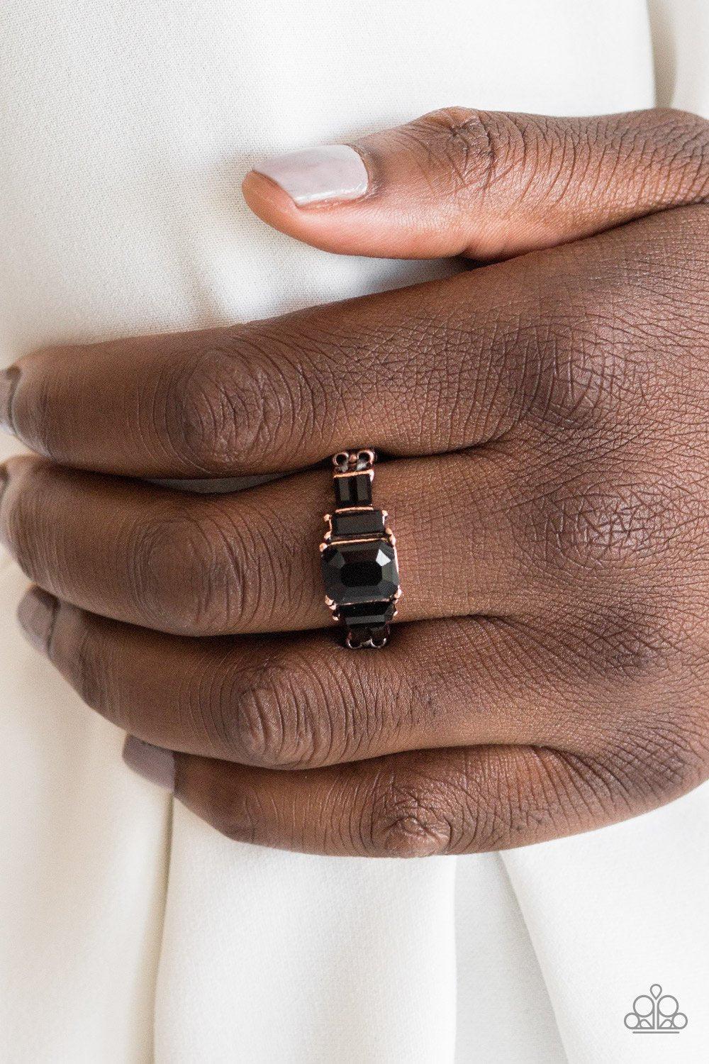 Born To Rule Copper and Black Rhinestone Ring - Paparazzi Accessories- on model - CarasShop.com - Paparazzi Jewelry by Cara Jewels