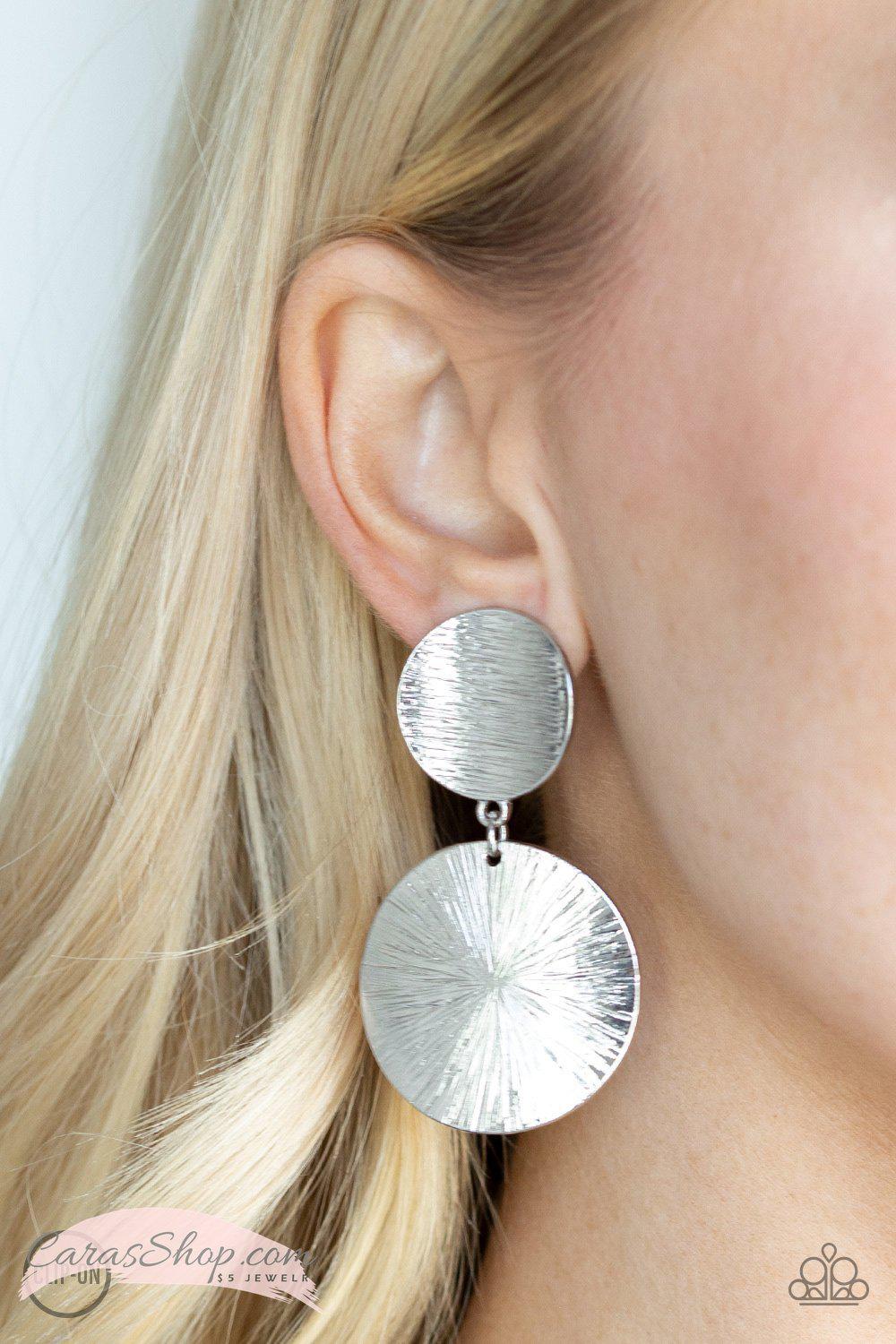 BRIGHT On Cue Silver Clip-On Earrings - Paparazzi Accessories- on model - CarasShop.com - Paparazzi Jewelry by Cara Jewels