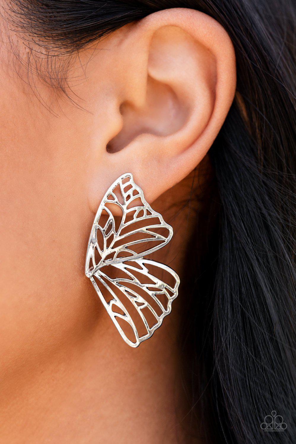 Butterfly Frills Silver Butterfly Post Earrings - Paparazzi Accessories- on model - CarasShop.com - Paparazzi Jewelry by Cara Jewels